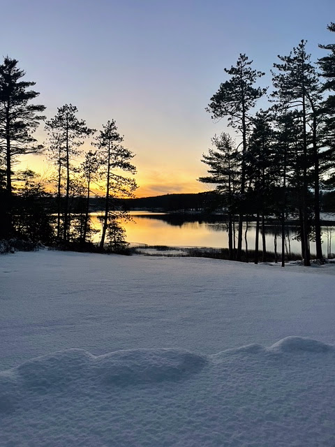 Winter sunset over the pond from the property